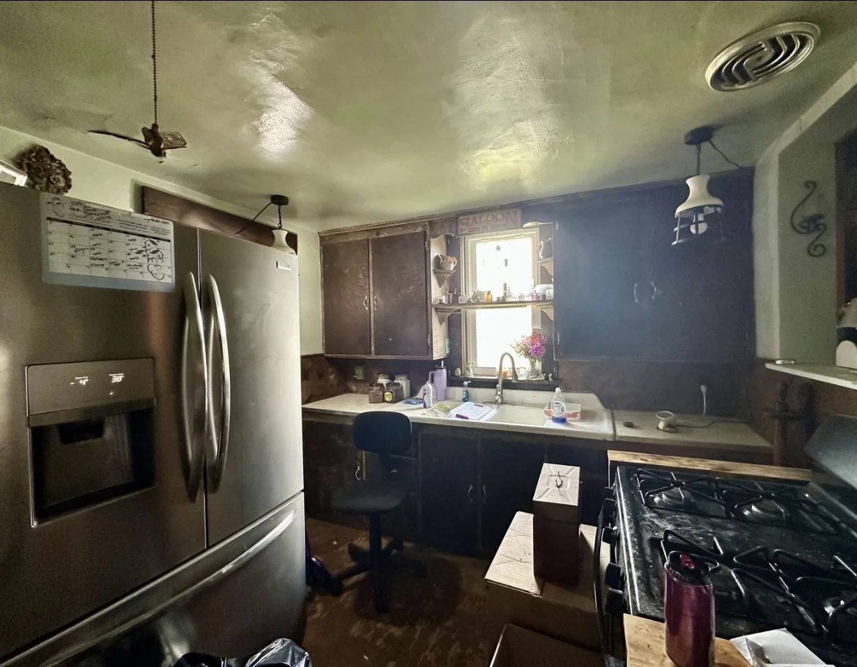 Kitchen at the Greenville probate property before renovation