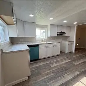 Yellow house kitchen after renovation