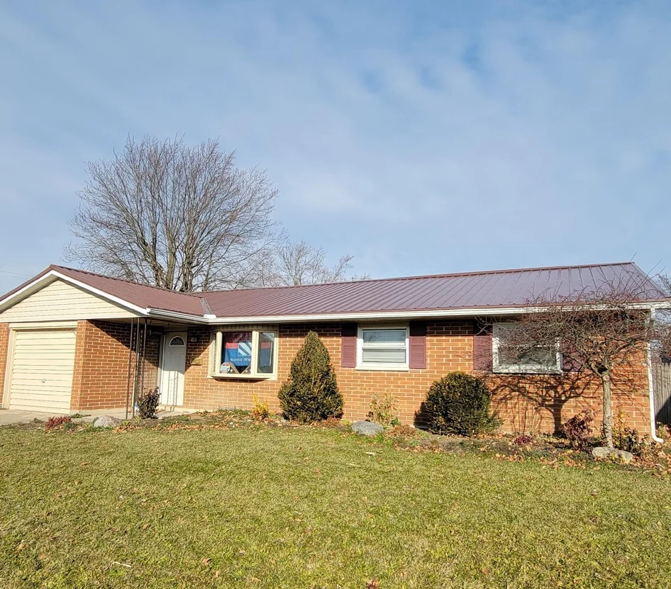 Brick ranch exterior after JEM renovation